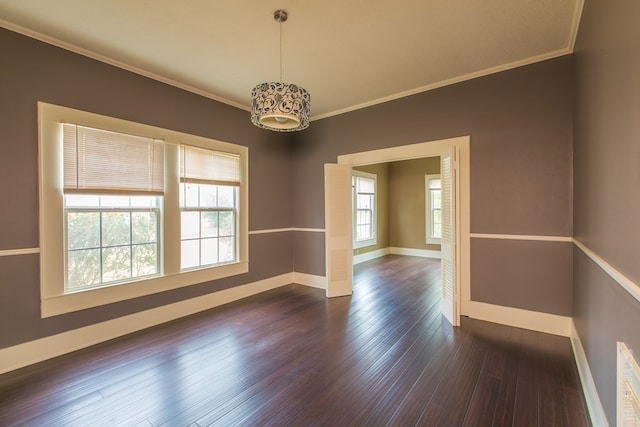 511 1st, Jasper, TX 75951 - unfurnished room featuring crown molding and dark wood-style flooring
