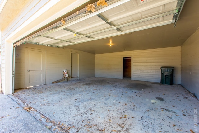 511 1st, Jasper, TX 75951 - garage featuring wooden walls