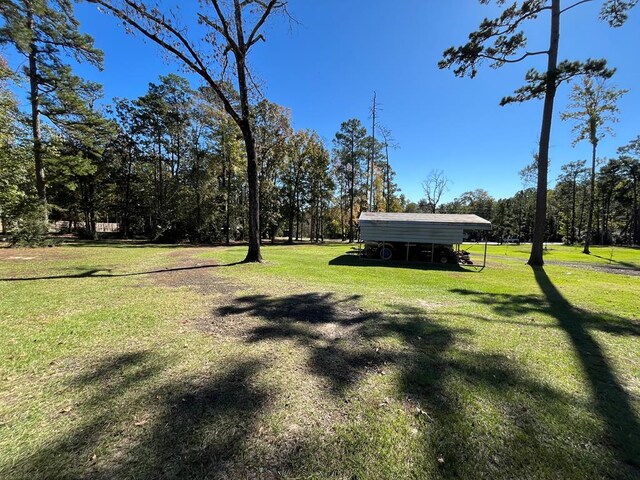 view of outbuilding with a yard