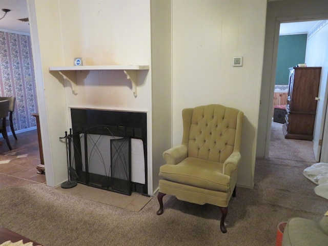 sitting room featuring tile patterned flooring