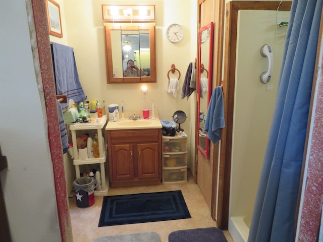 bathroom with a shower with curtain and vanity