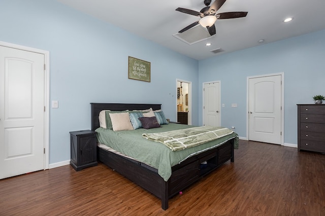 bedroom featuring ceiling fan, dark hardwood / wood-style flooring, and ensuite bath