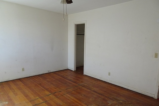 unfurnished bedroom with wood-type flooring and ceiling fan