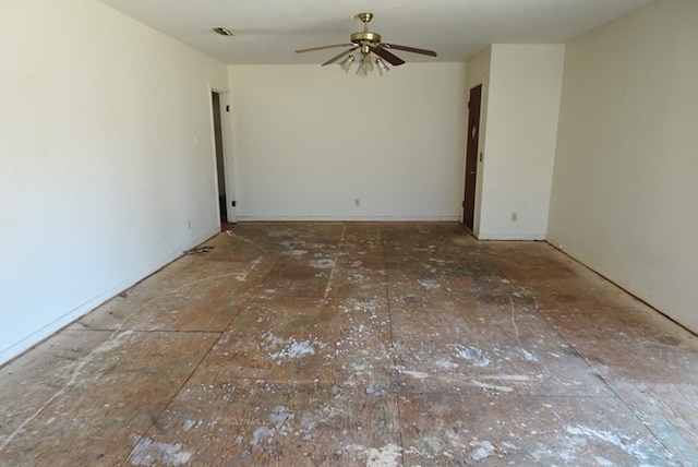 unfurnished room featuring ceiling fan and visible vents