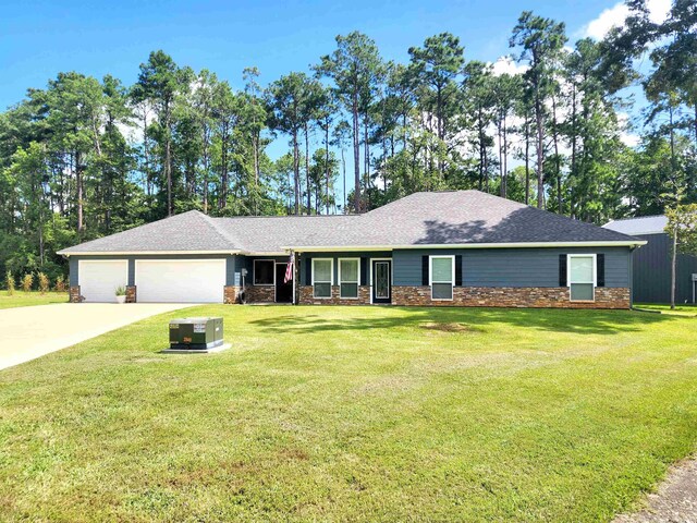 ranch-style house with a garage and a front lawn