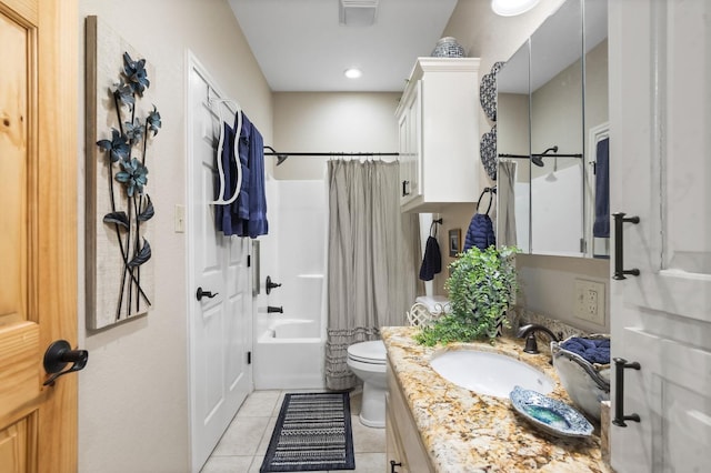 full bathroom featuring shower / bath combo, vanity, tile patterned floors, and toilet
