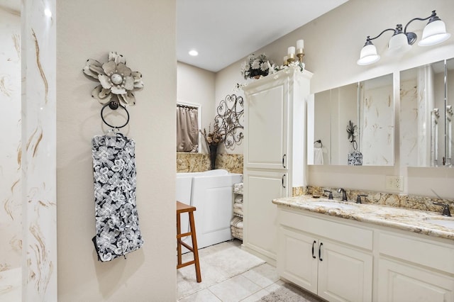 bathroom featuring vanity and tile patterned flooring
