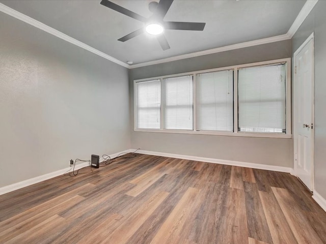 2524 US Highway 69 N, Lufkin, TX 75904 - unfurnished room featuring wood finished floors, baseboards, ceiling fan, and crown molding