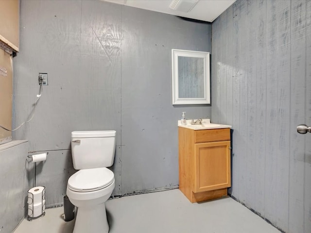 2524 US Highway 69 N, Lufkin, TX 75904 - bathroom featuring toilet, vanity, and concrete flooring