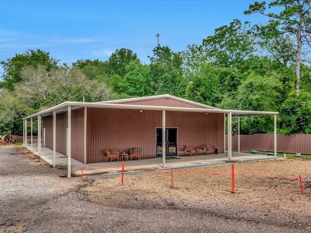 2524 US Highway 69 N, Lufkin, TX 75904 - view of side of home featuring a patio