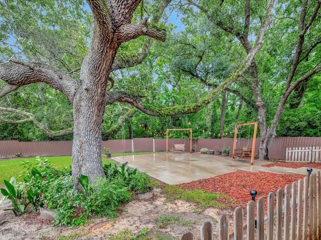 2524 US Highway 69 N, Lufkin, TX 75904 - fenced backyard featuring a patio area