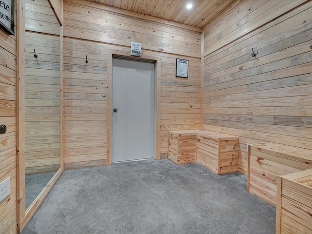 2524 US Highway 69 N, Lufkin, TX 75904 - unfurnished room with wooden walls, wood ceiling, and carpet flooring