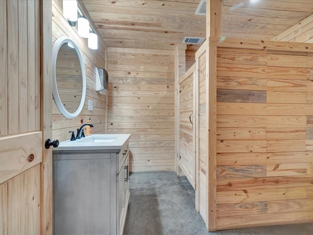 2524 US Highway 69 N, Lufkin, TX 75904 - bathroom with wood ceiling, vanity, and wood walls