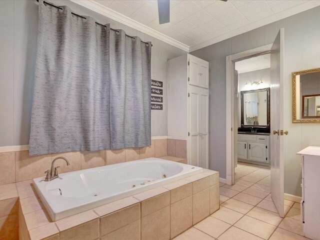 2524 US Highway 69 N, Lufkin, TX 75904 - bathroom featuring vanity, a whirlpool tub, tile patterned flooring, and ornamental molding