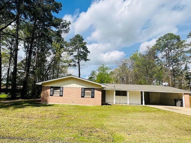 ranch-style home with a front lawn and a carport