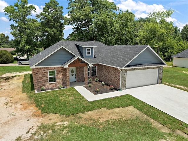 craftsman-style home with a front lawn and a garage