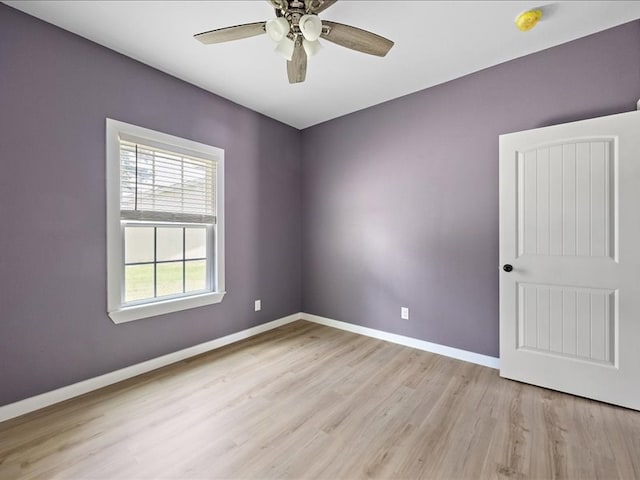 unfurnished room with light hardwood / wood-style flooring and ceiling fan