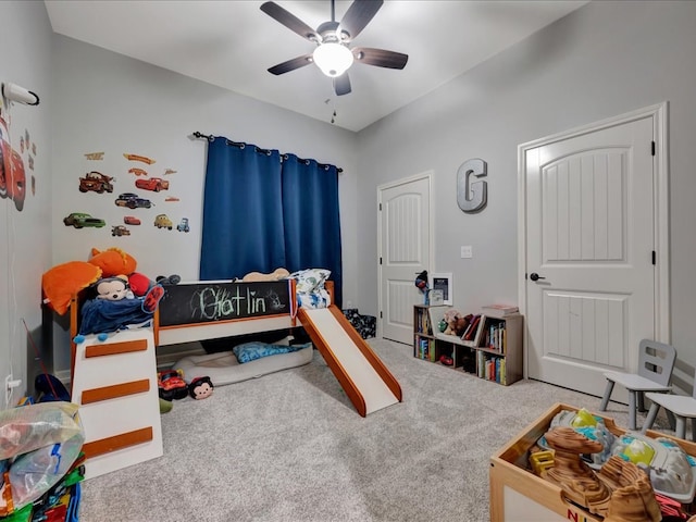 carpeted bedroom with ceiling fan