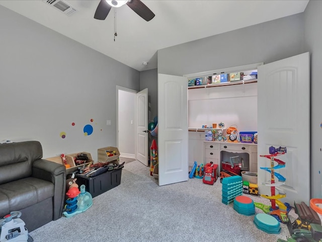 recreation room featuring ceiling fan, carpet floors, and lofted ceiling