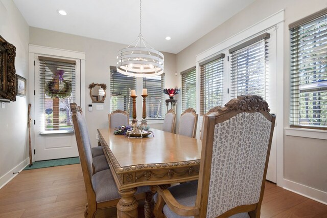 373 Duffer Dr, Brookeland, TX 75931 - dining area with a chandelier, wood finished floors, baseboards, and recessed lighting