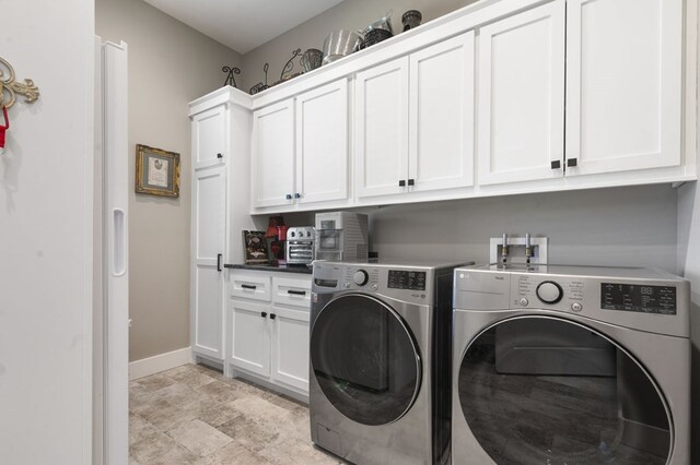373 Duffer Dr, Brookeland, TX 75931 - laundry room featuring independent washer and dryer, cabinet space, and baseboards