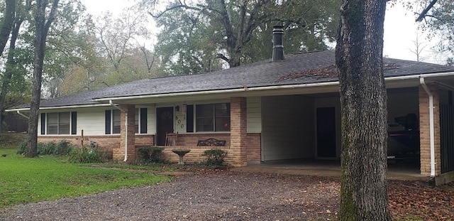 ranch-style house with a front lawn