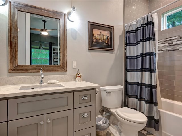 410 Brentwood Dr, Lufkin, TX 75901 - bathroom featuring vanity, a ceiling fan, and shower / bathtub combination with curtain