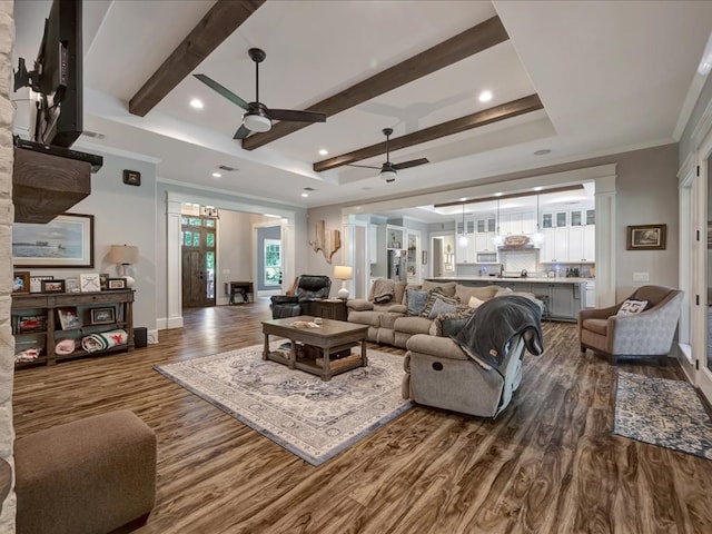 410 Brentwood Dr, Lufkin, TX 75901 - living area featuring a ceiling fan, dark wood-style floors, recessed lighting, beamed ceiling, and crown molding