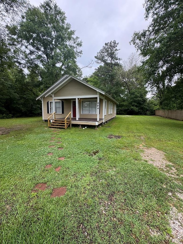 bungalow with a front yard