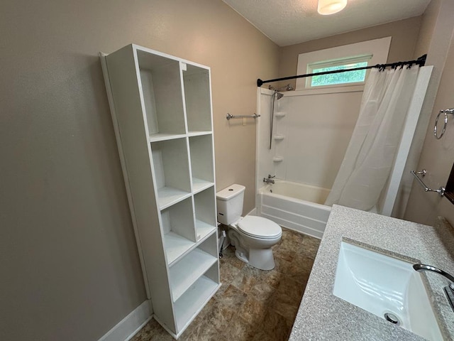 bathroom with shower / bathtub combination with curtain, a textured ceiling, toilet, and a sink