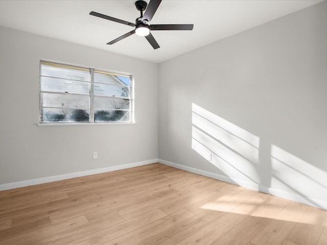 unfurnished room with ceiling fan and light hardwood / wood-style flooring