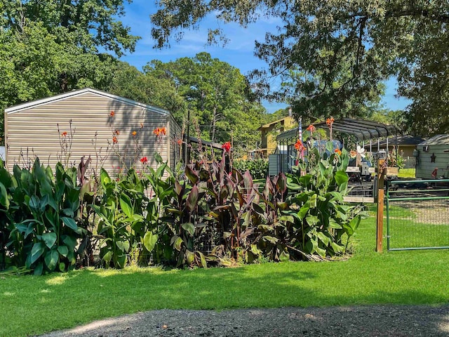 220 N Pamela Dr, Brookeland, TX 75931 - view of yard with a detached carport