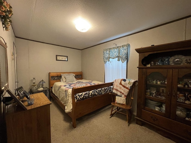 220 N Pamela Dr, Brookeland, TX 75931 - carpeted bedroom with a textured ceiling