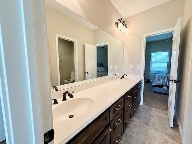 300 Deer Trace Blvd, Diboll, TX 75941 - bathroom with ensuite bathroom, double vanity, and stone finish floors