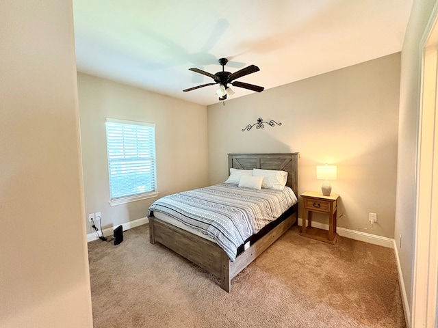300 Deer Trace Blvd, Diboll, TX 75941 - carpeted bedroom featuring baseboards and a ceiling fan