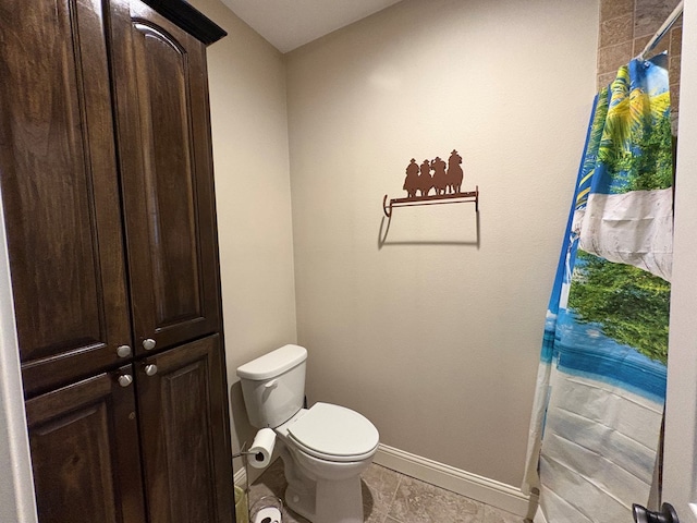 300 Deer Trace Blvd, Diboll, TX 75941 - bathroom featuring toilet and baseboards