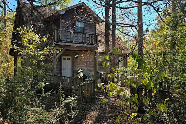 exterior space with a balcony