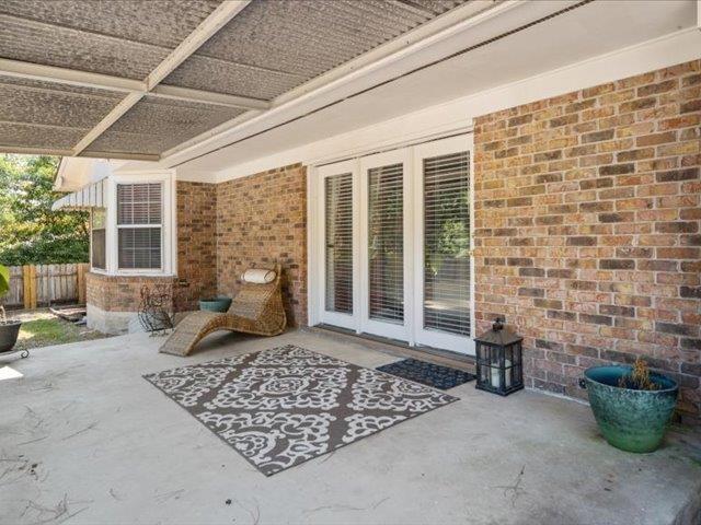 view of patio featuring french doors