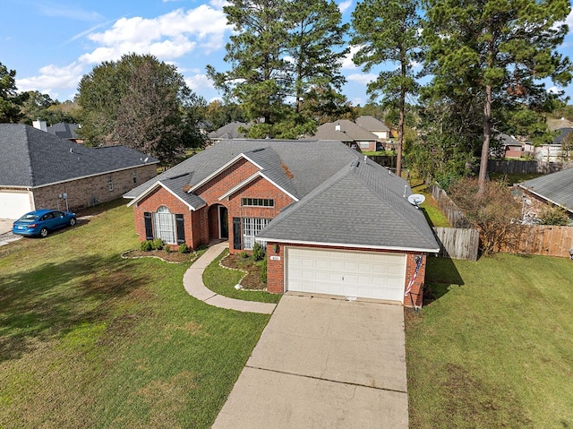 view of front of home featuring a garage and a front lawn