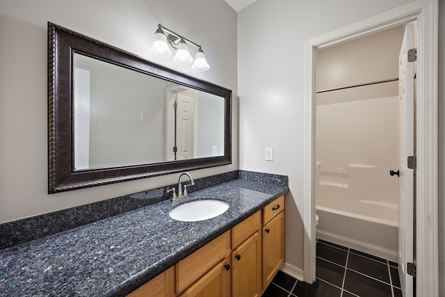 full bathroom featuring tile patterned flooring, vanity, toilet, and tub / shower combination