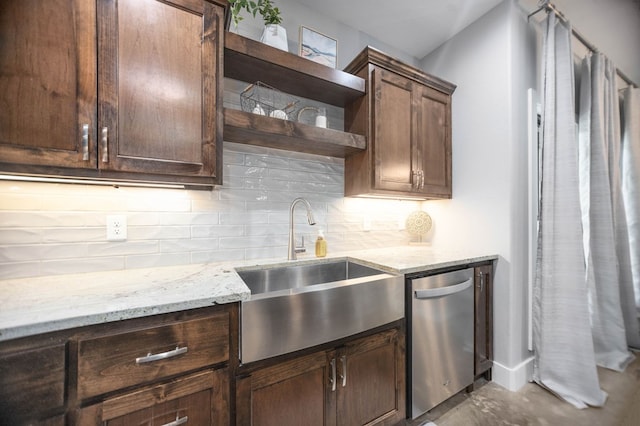 kitchen with open shelves, dark brown cabinetry, dishwasher, a sink, and backsplash