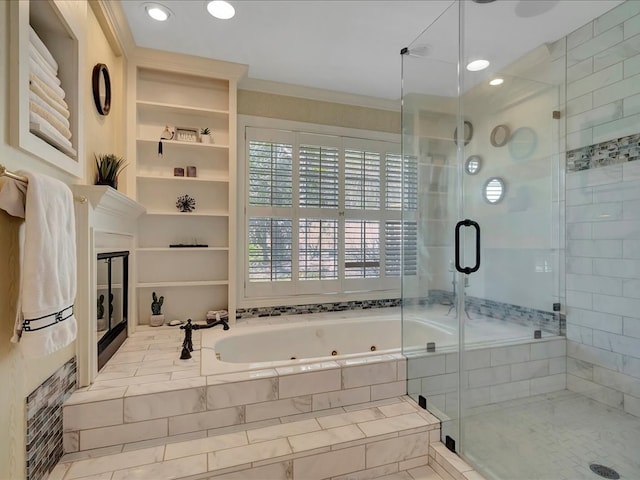 bathroom with crown molding and independent shower and bath