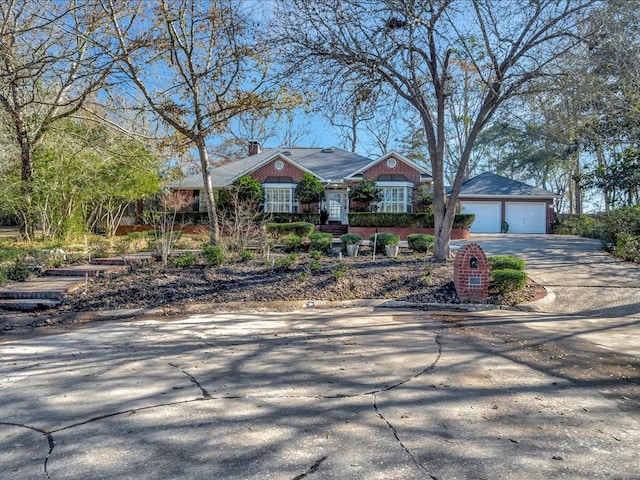 single story home with a garage