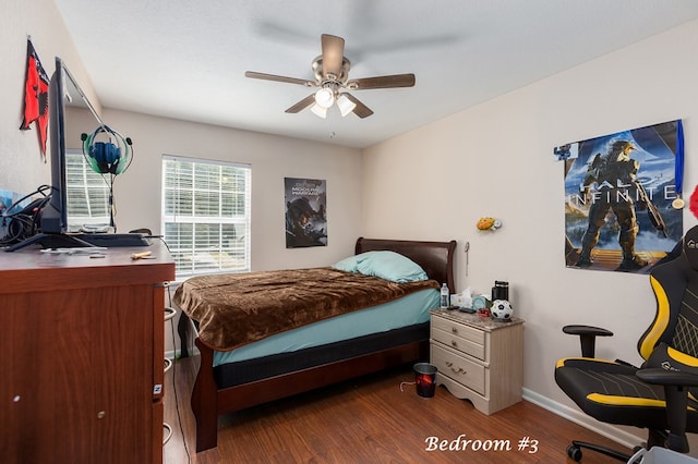 bedroom featuring dark hardwood / wood-style floors and ceiling fan