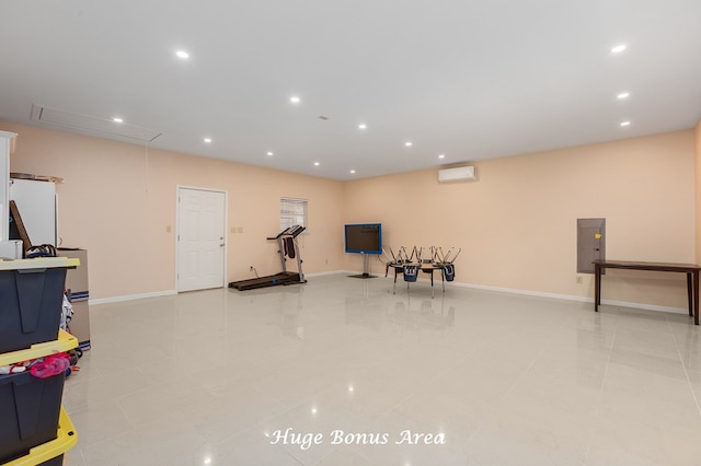 exercise area featuring light tile patterned floors and a wall mounted AC