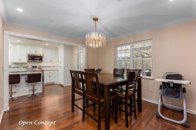 dining room featuring dark wood-type flooring, baseboards, an inviting chandelier, and crown molding