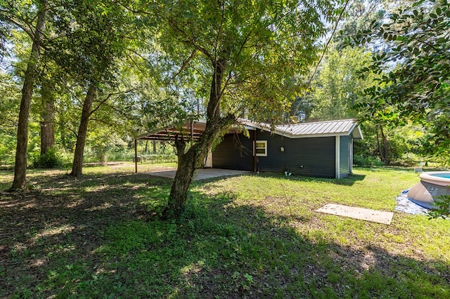 view of yard with a carport