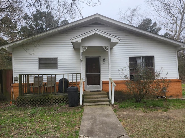 bungalow-style house featuring entry steps