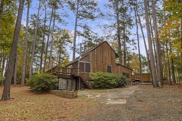 view of home's exterior with a deck