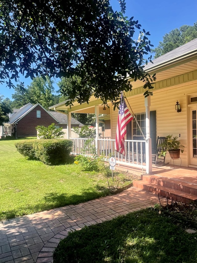 view of yard with a porch